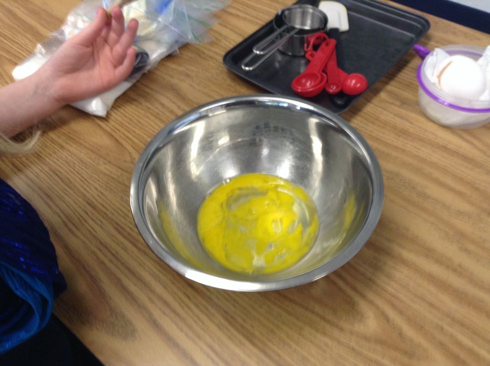 Next, beat in eggs one at a time.