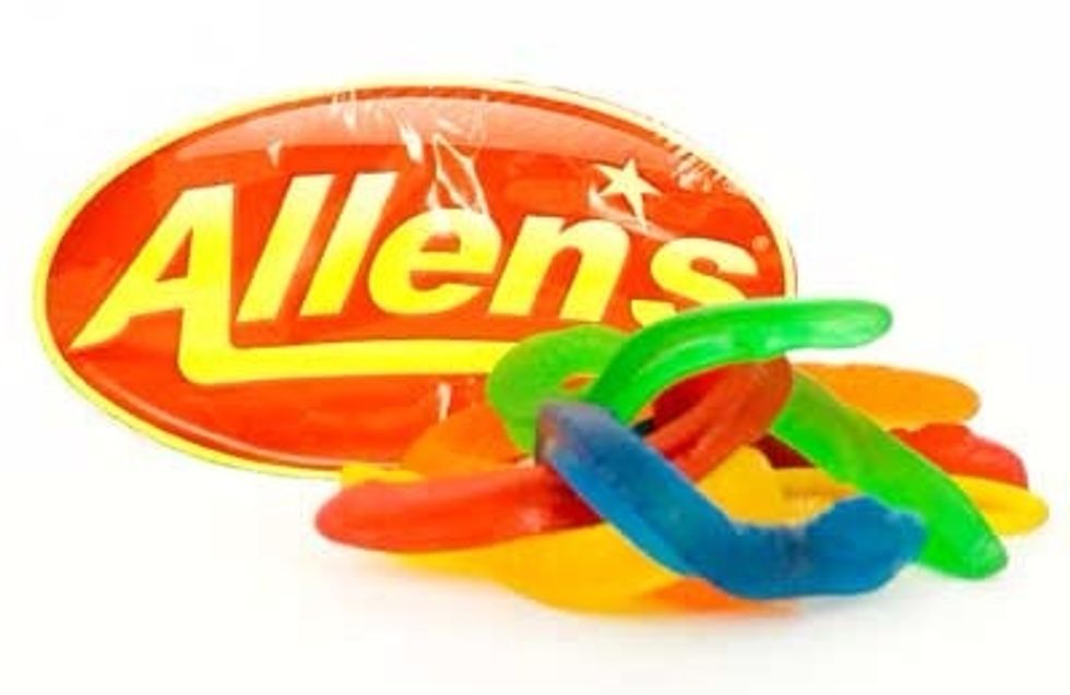Next break the snakes into little pieces and put them into the bowl of melted chocolate.