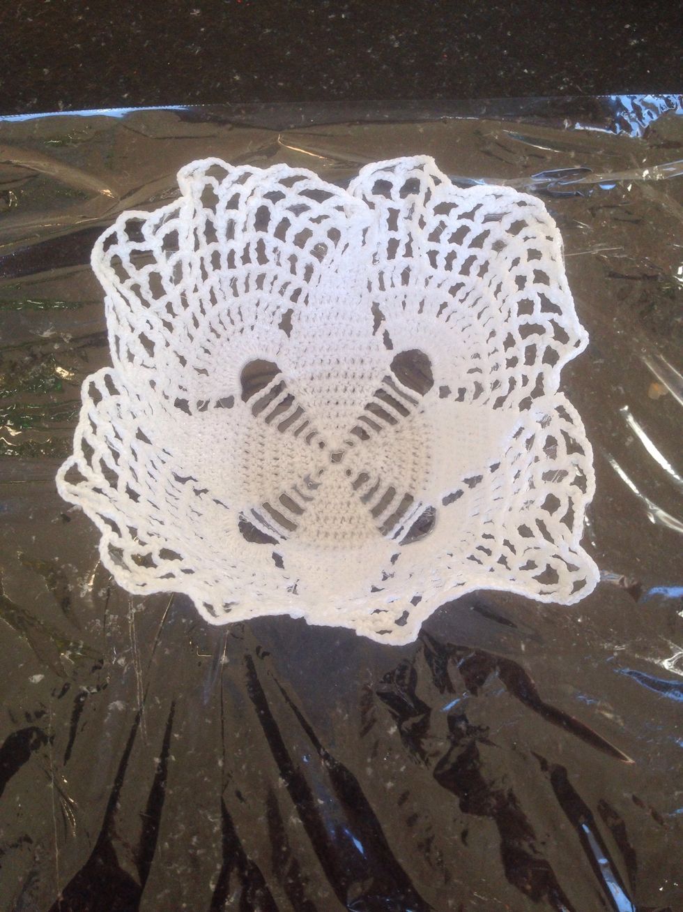 Next carefully pull the foil of the doilies. Afterwards you might want to cut excess glue or foil of with an exacto knife