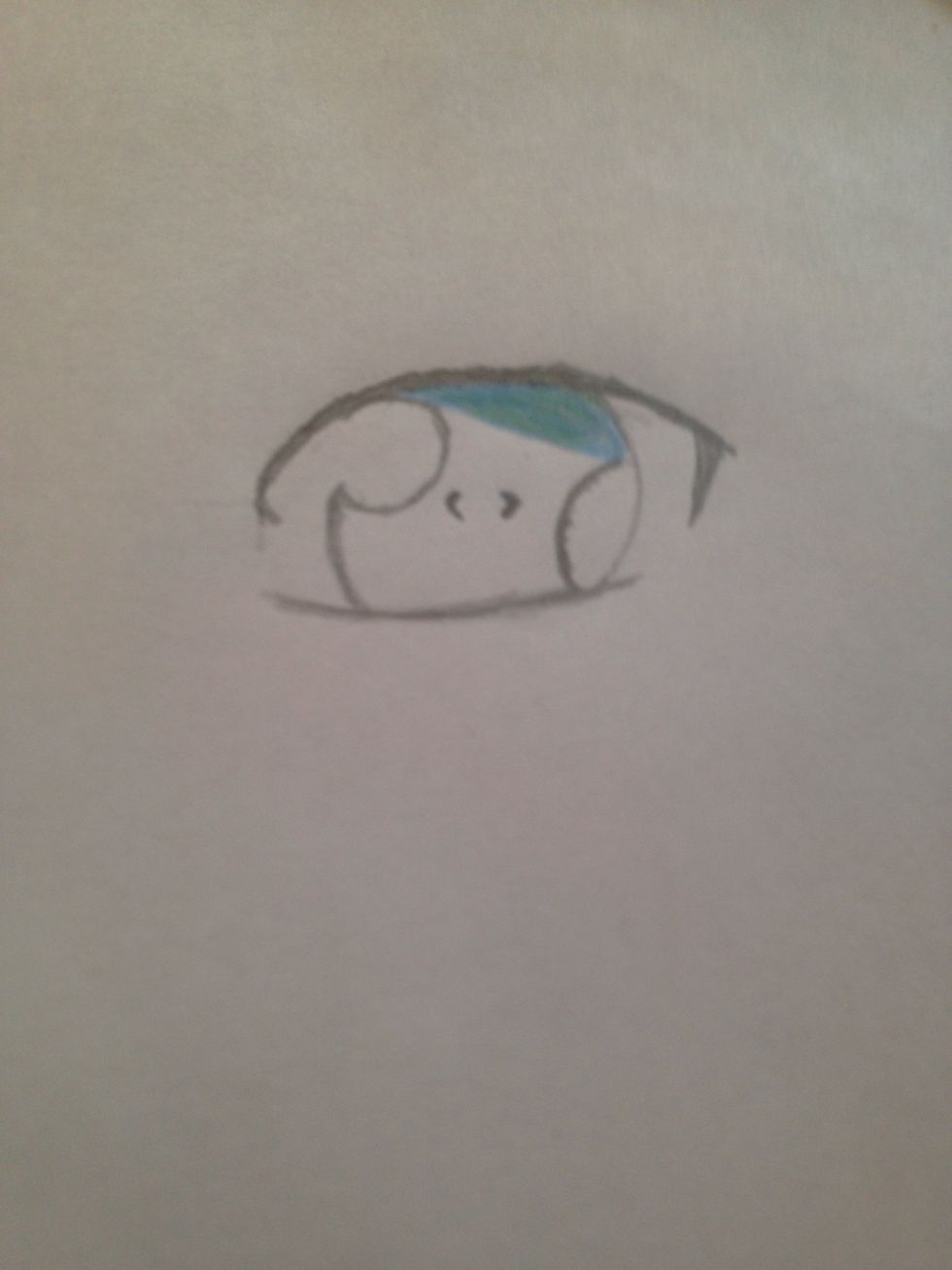 Next, Choose a color and color the the upper part in the inside of the eye. If you don't have color pencils, just  darkly color with your pencil.