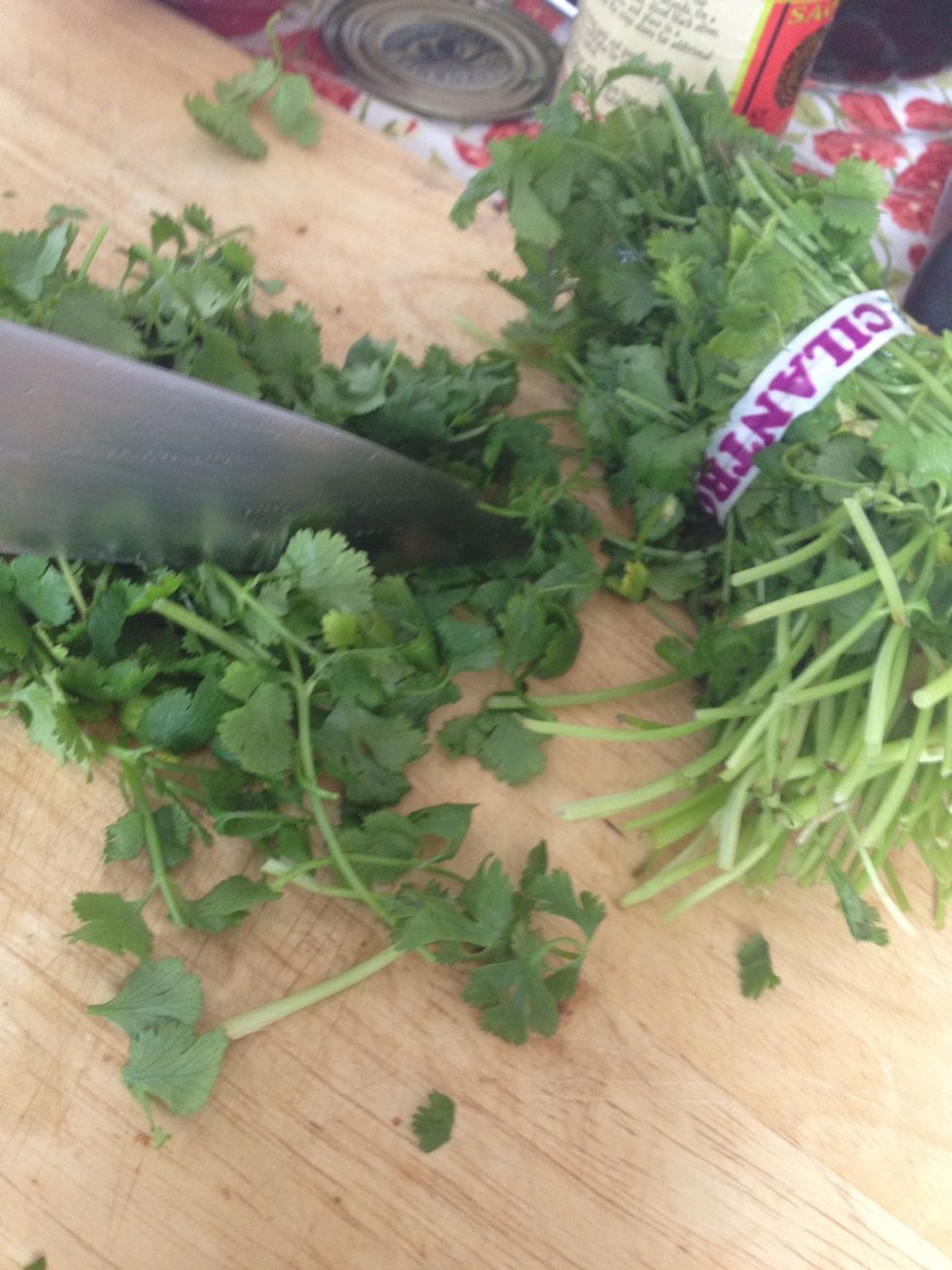 Next - chop fresh cilantro. If you don't like cilantro don't use it. But I love cilantro so I'm using a bunch. Literally.