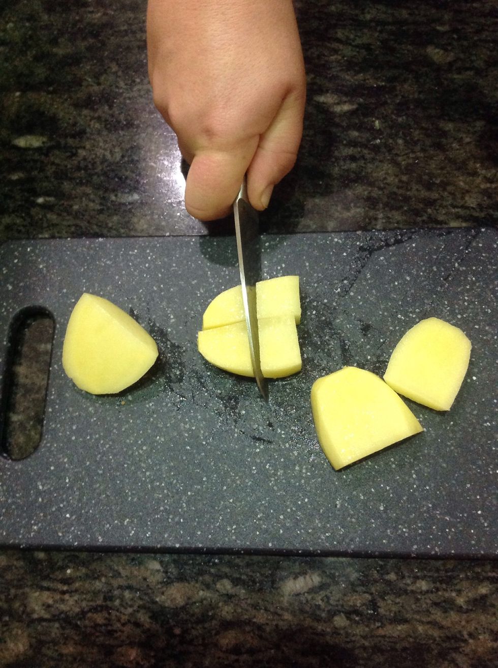 Next chop the potatoes.