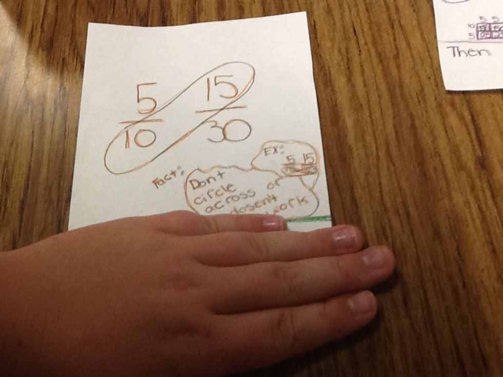 Next circle two numbers each from a different fraction