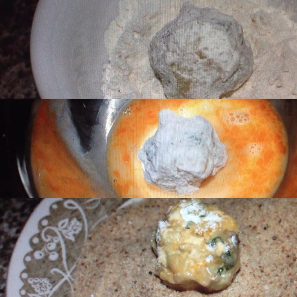 Next, coat the ball with the flour, then the egg mixture, then finally the breadcrumbs