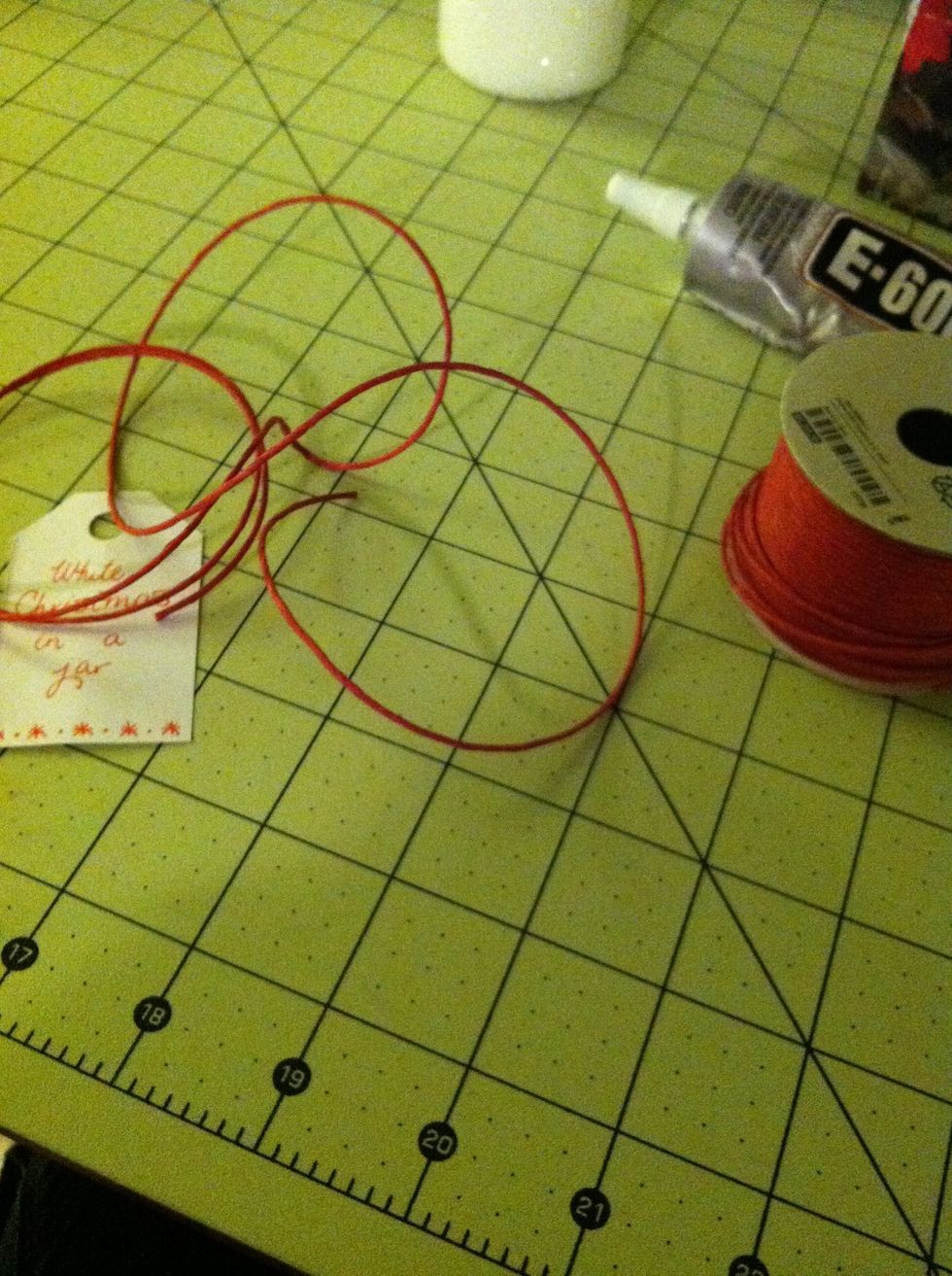 Next, cut a pretty long piece of twine.