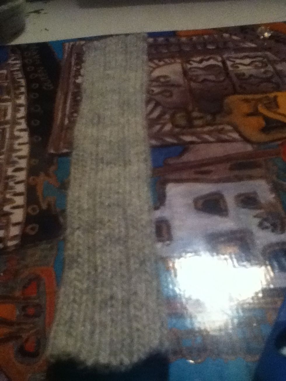 Next cut a thinner shorter strip of your sock you don't need to fix the edges on this piece