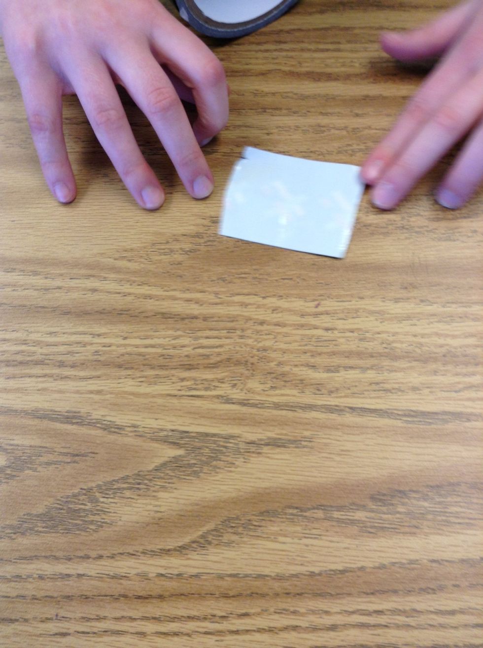 Next, cut out three square-shaped pieces of duct tape like you did in step #2.