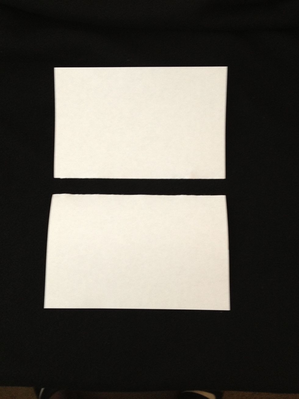Next cut paper into two pieces.