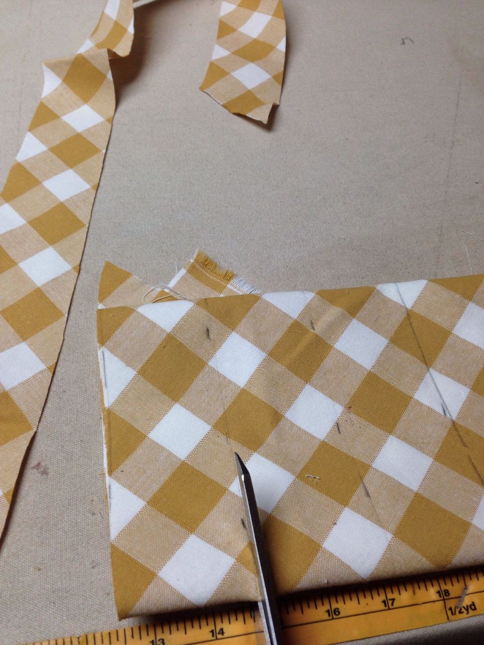 Next cut the bias banding strips 2 1/4" wide. Steps for doing so can be viewed on our website: http://www.patemeadows.com/Cutting-Bias-Strips-for-Piping-and-Banding_ep_61.html