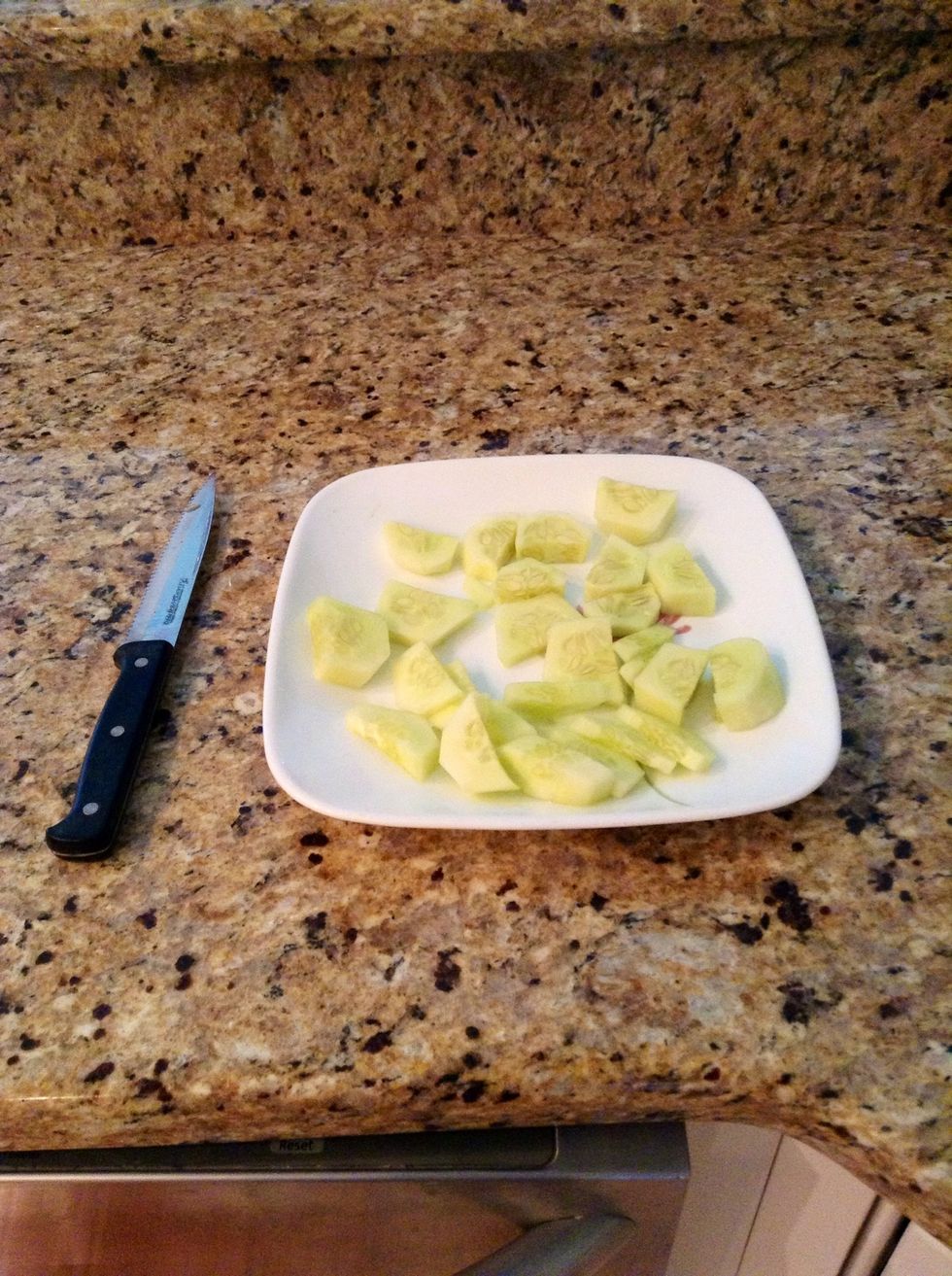 Next, cut the cucumber into small pieces.