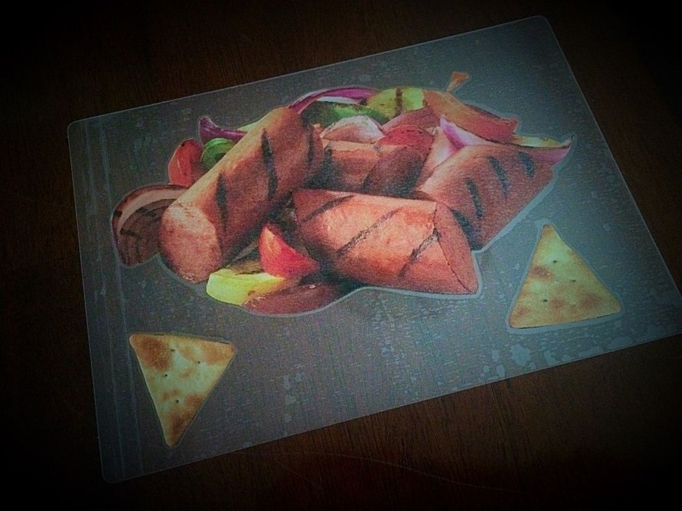 Next, cut the extra laminate away but be sure to leave about 1/4-1/2 an inch on the edges.