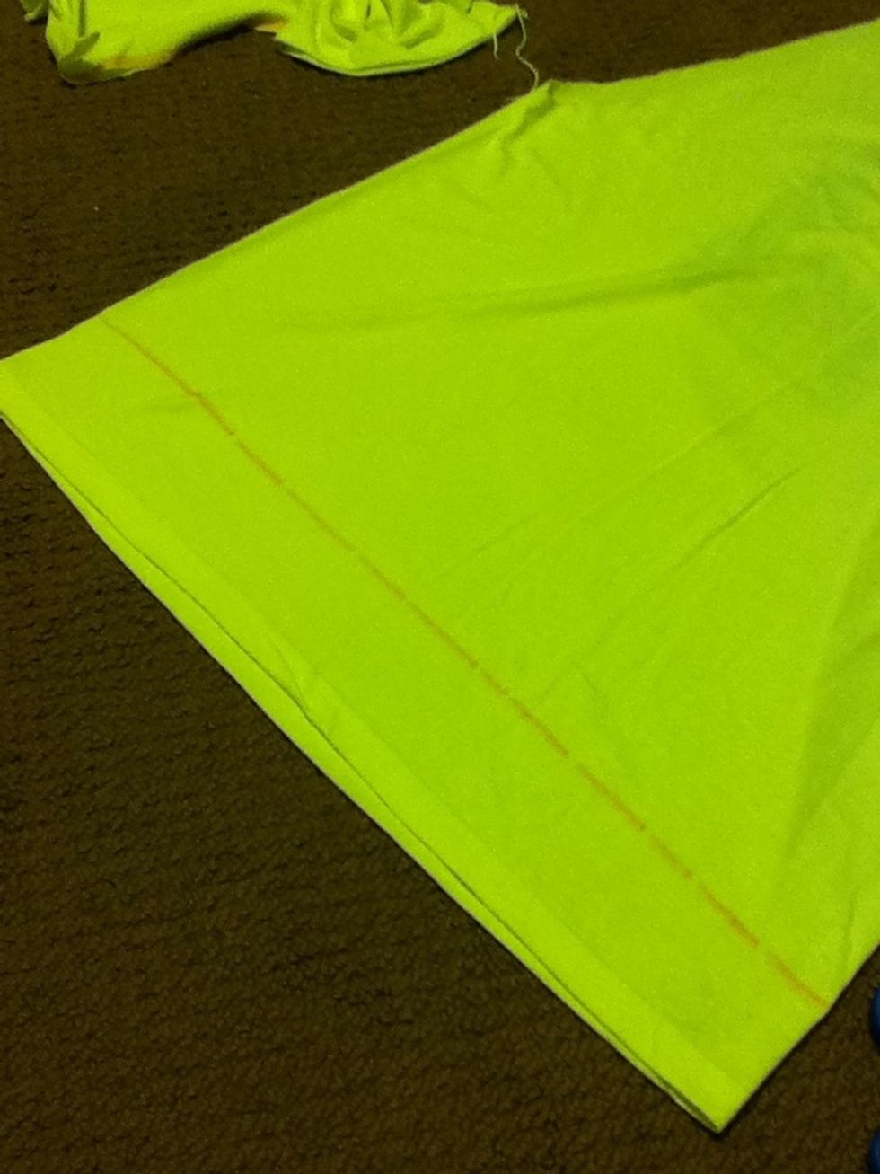 Next cut the shirt but don't cut it to fit you PERFECT because its going to get shorter in the next step!