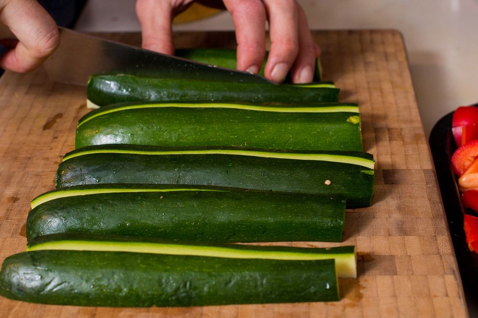 next cut them into quarters.