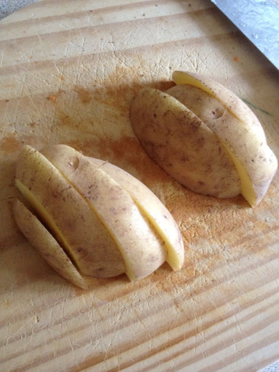 Next cut them lengthways like this.