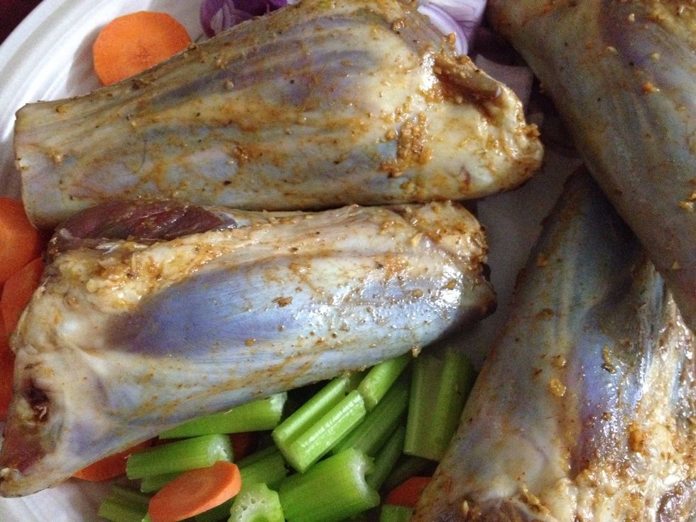 Next day, when you're ready to cook, scrape off marinade from lamb shanks. This is to stop the spices from burning while you're browning your shanks.