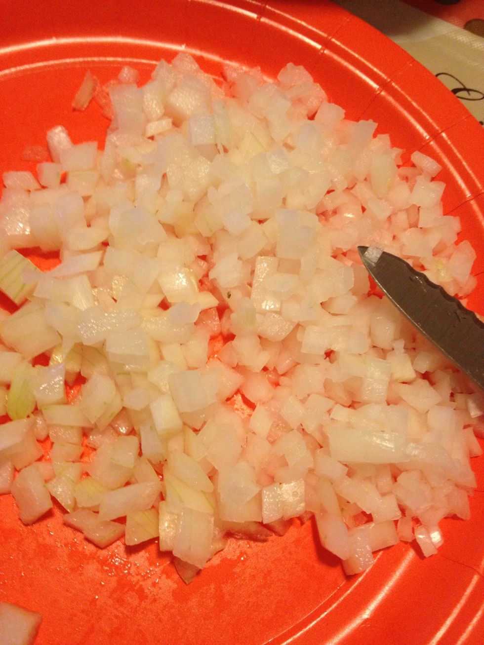 Next, dice onion into small pieces just like the tomato. I only use half an onion because I feel that the taste can be overpowering!