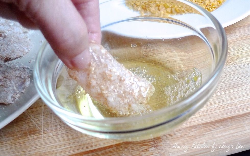 Next, dip each piece of fish, one at a time, in the egg white.