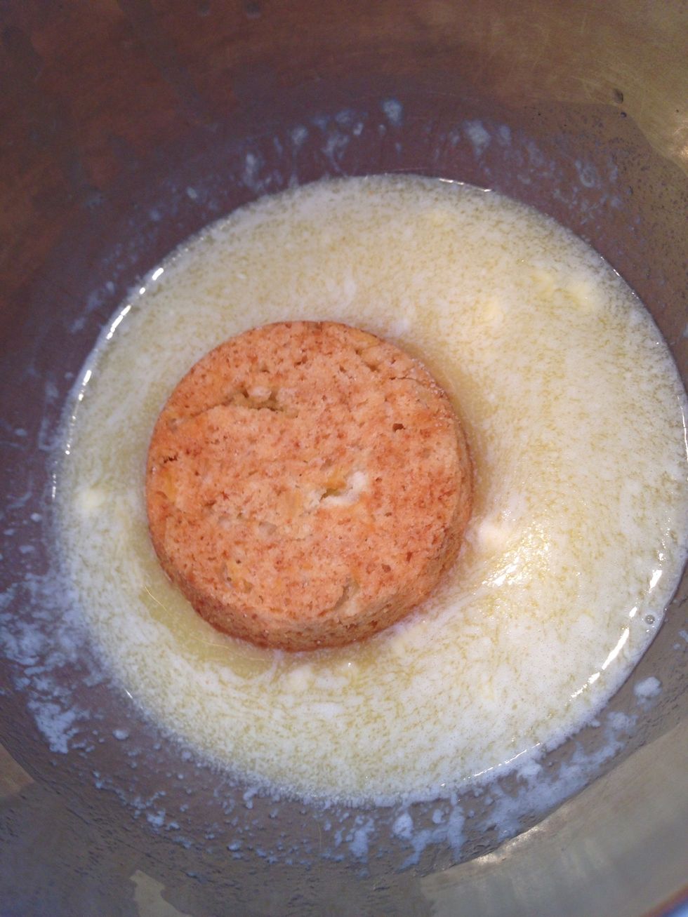 Next, dip the doughnuts in the melted butter. How deeply you dip is up to you. You can always melt more butter if you run out. No one needs to know.