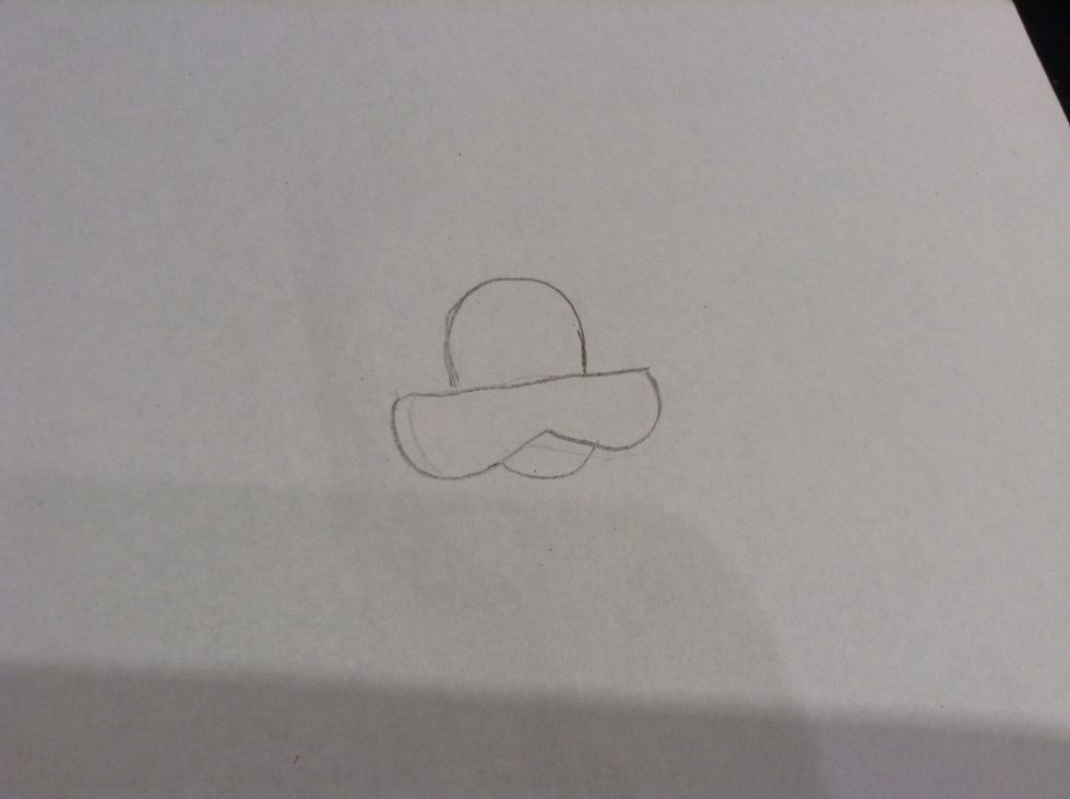 Next draw a line off the bump and draw 2 bumps under the line but attached and do 1 bump in the in the middle under the 2 bumps (confusing sorry\ud83d\ude1c)