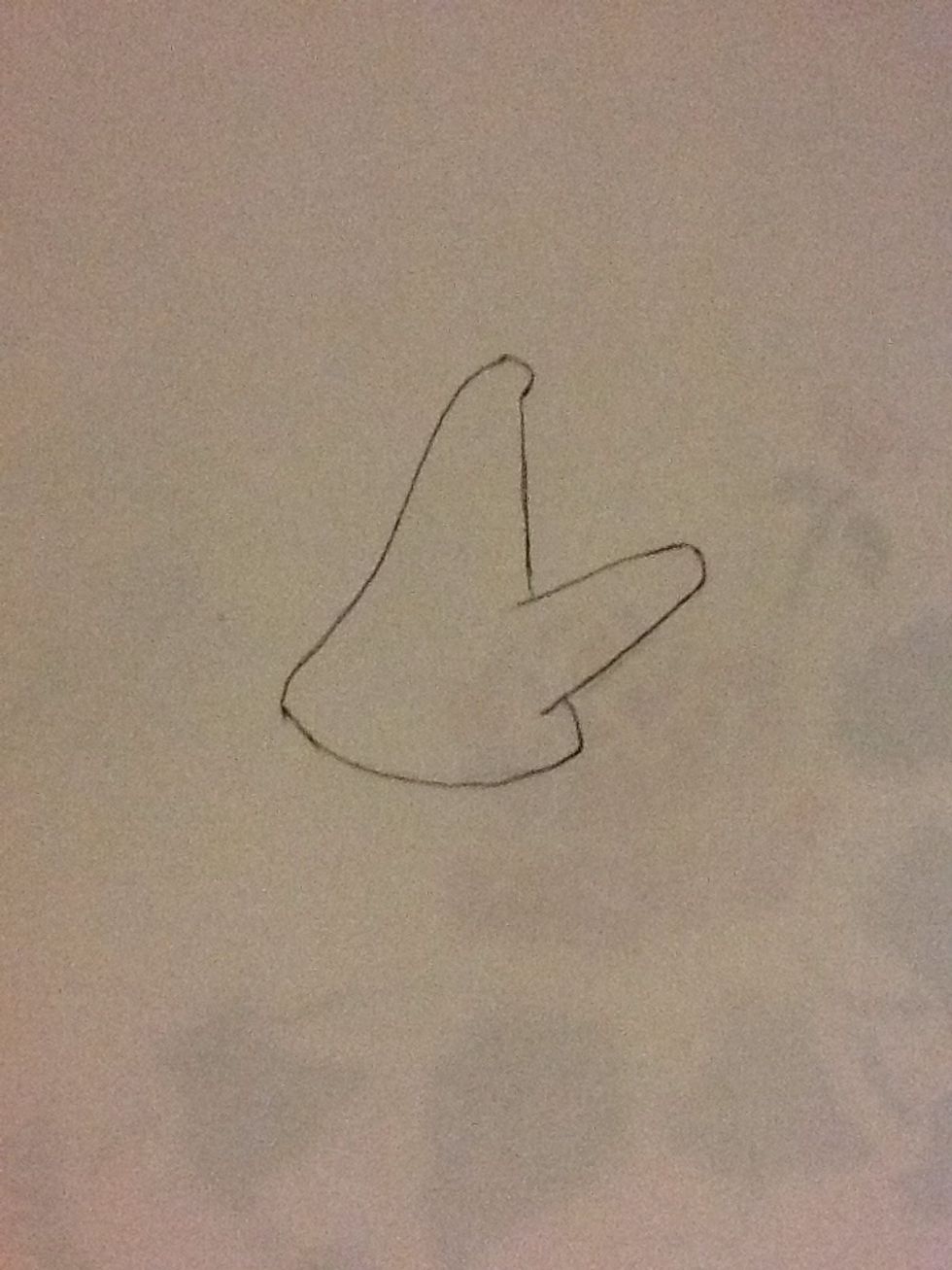 Next, draw a line to finish off his body that connects to the head.