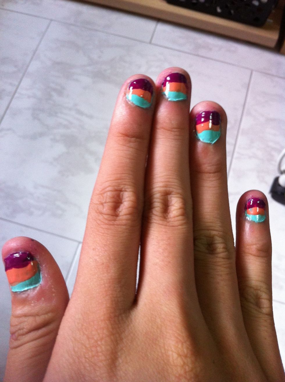 Next , draw another streak below the medium colored nail polish and let it dry , don't worry if its messy , you'll eventually be using the nail art pen to go over the messed up parts \u263a