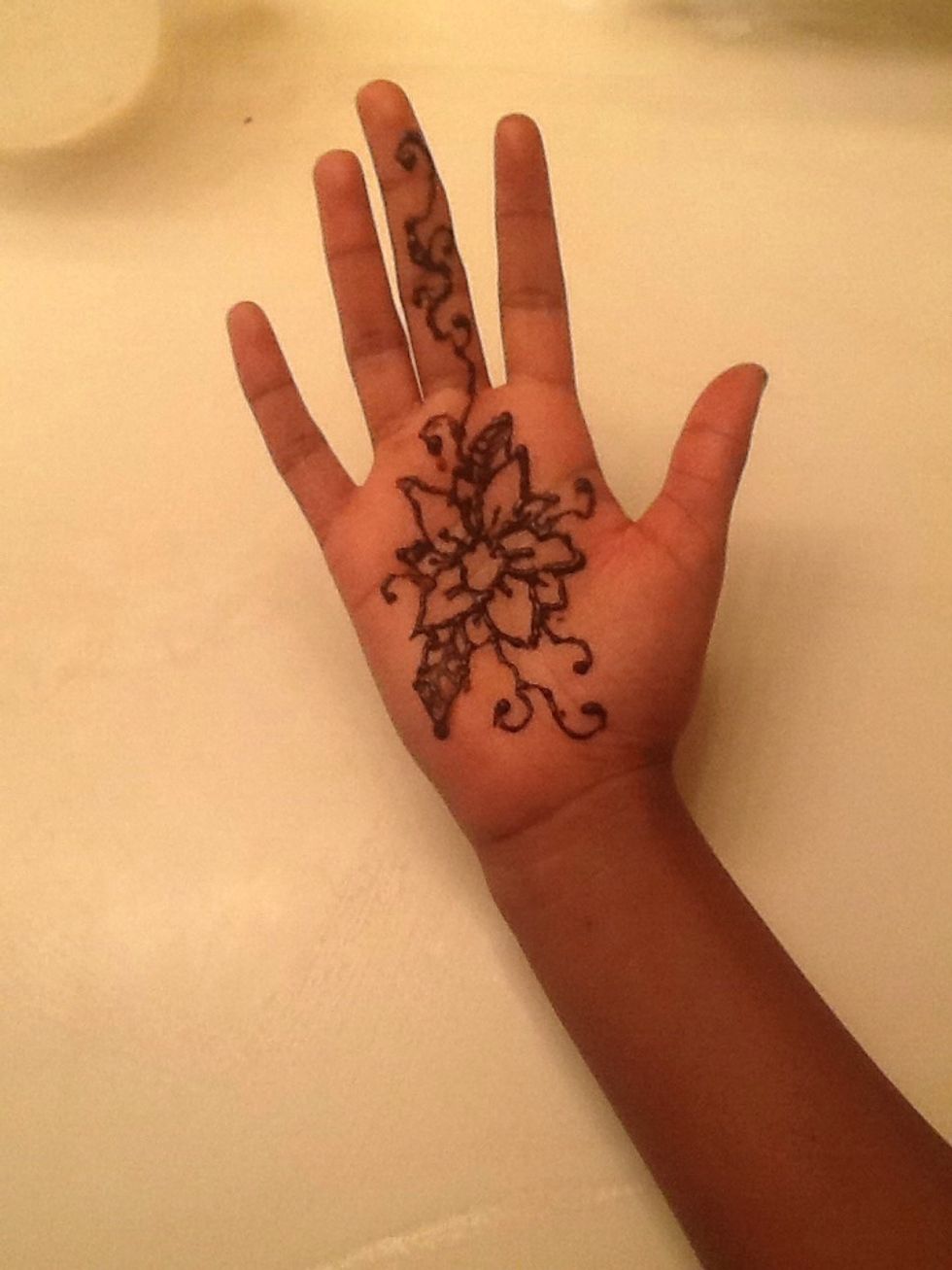 Next, draw more curves but, coming out of the flower. Push more on the tube at the ends of your curves.