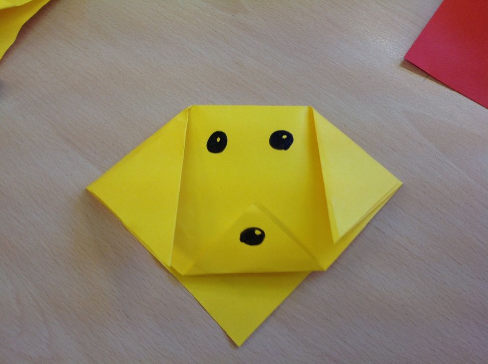 Next draw on the nose with a black pen.