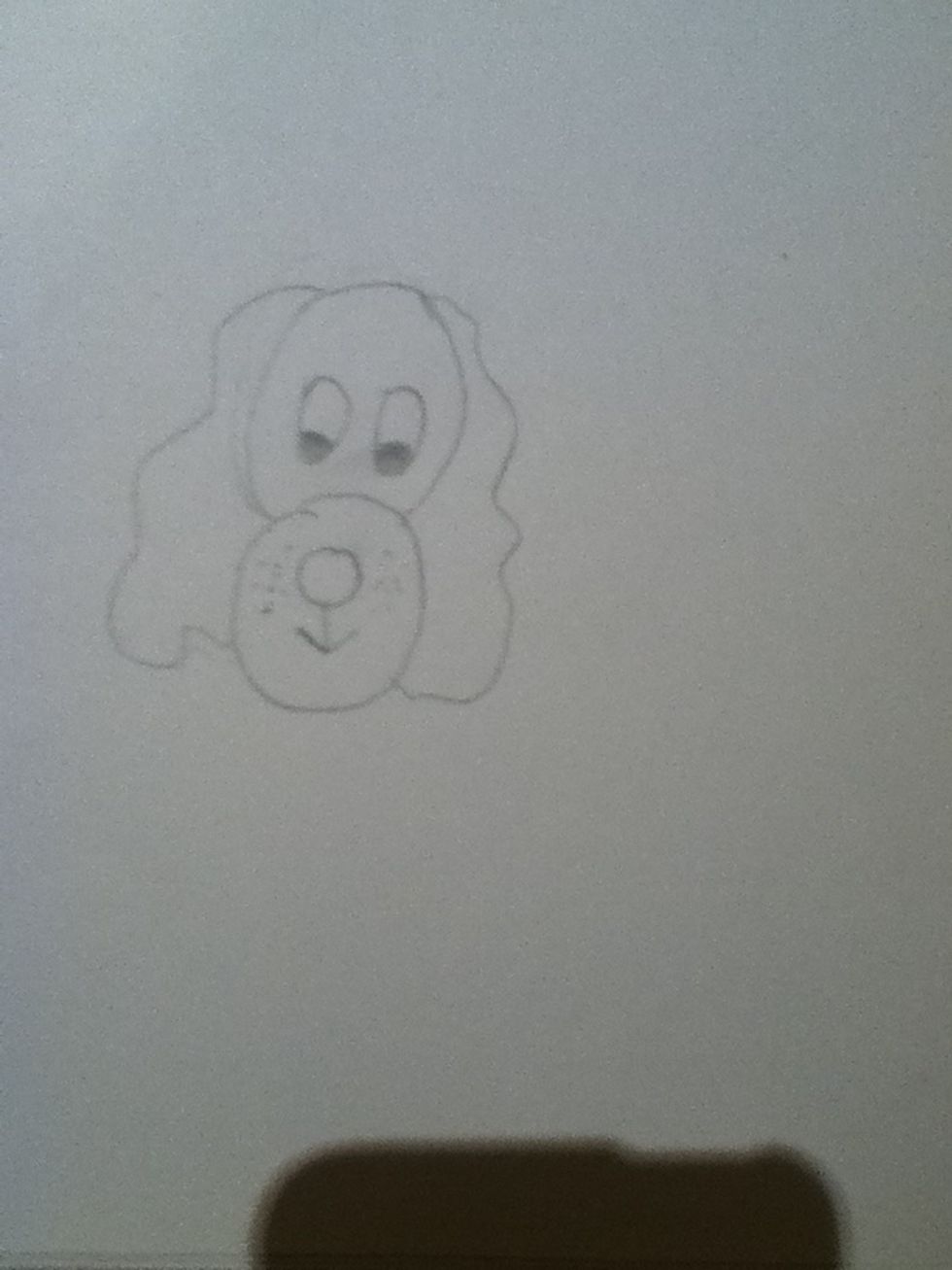 Next draw some wavy lines coming from the top of the head that meet at the chin, these are ears.