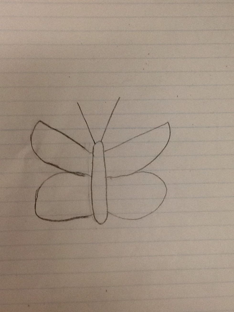 Next draw two long lines for antennaes.
