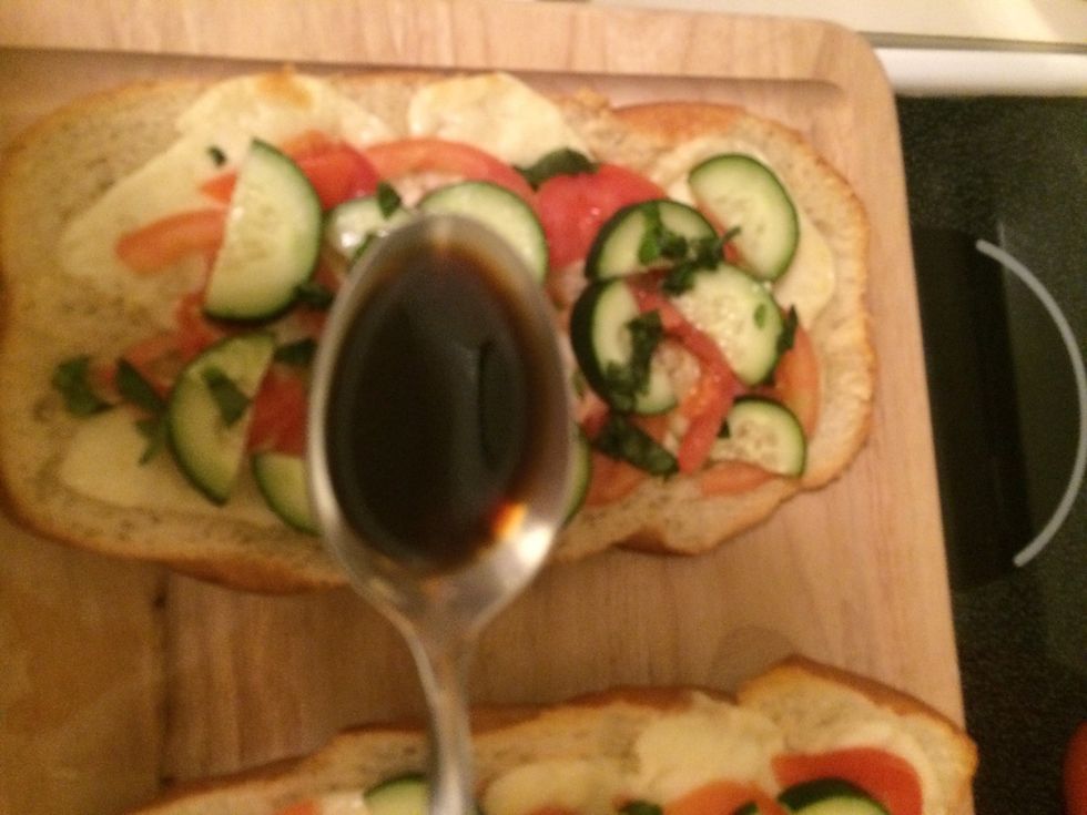 Next drizzle a 1/2 tablespoon over each bread