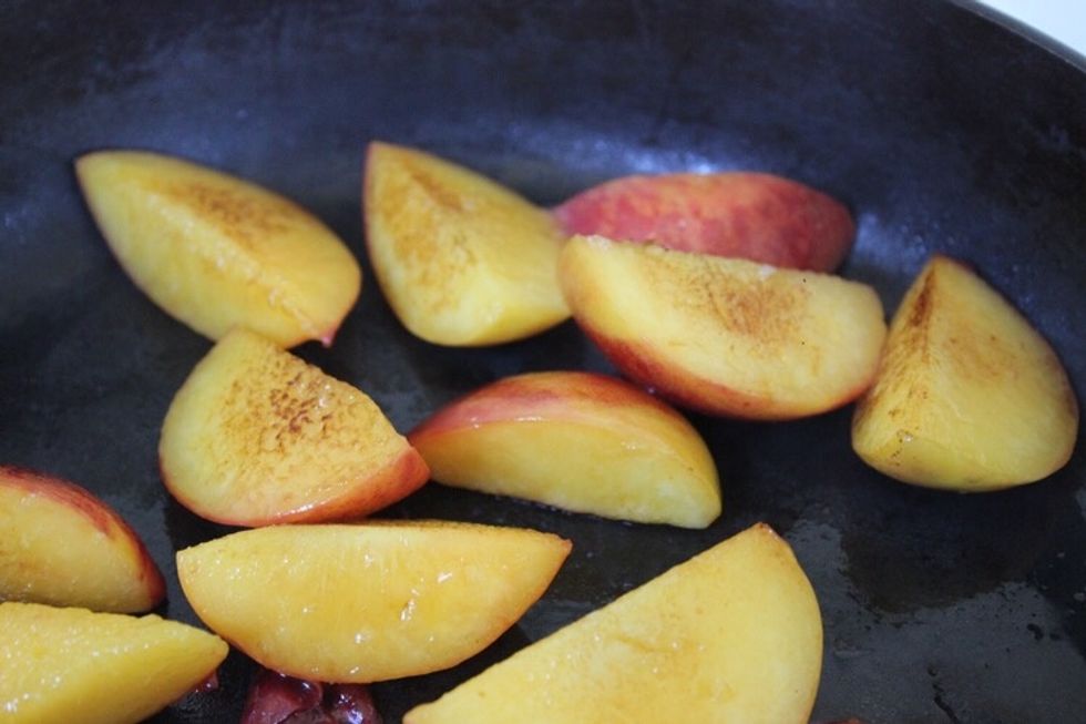 Next, drizzle a little EVOO in a medium saucepan. Then add the peach slices, rotate on each side for about 10 seconds. Just until they begin to caramelize.