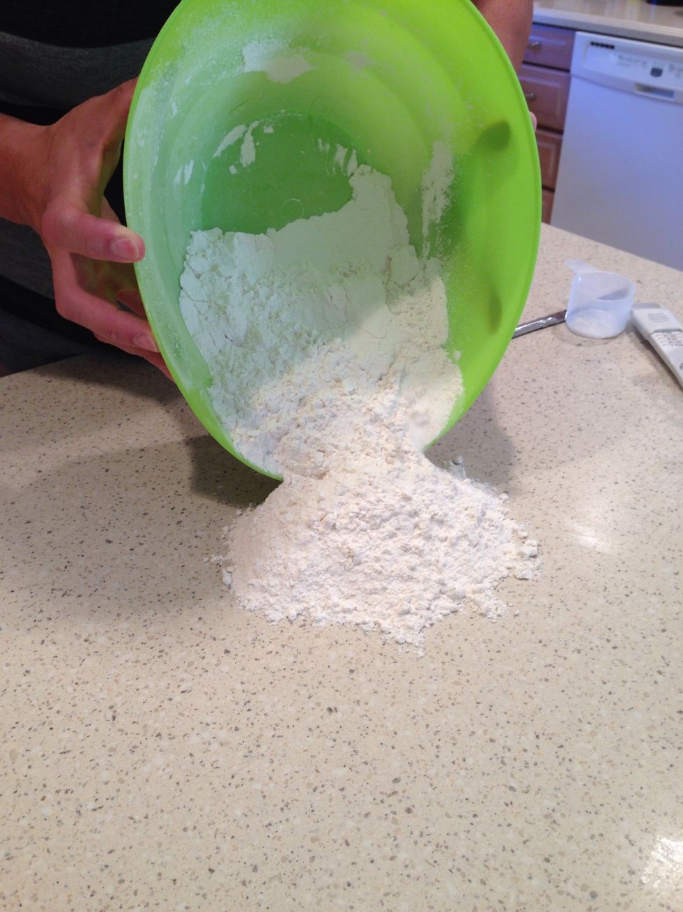 Next, dump the dry ingredients onto the counter. Make sure it's clean first!