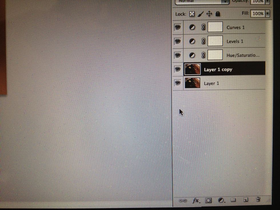 Next duplicate your photo. Highlight your layer and hit CTRL+J (Command+J on Mac) or you can press the little notepad near the trash icon in the layers palette.