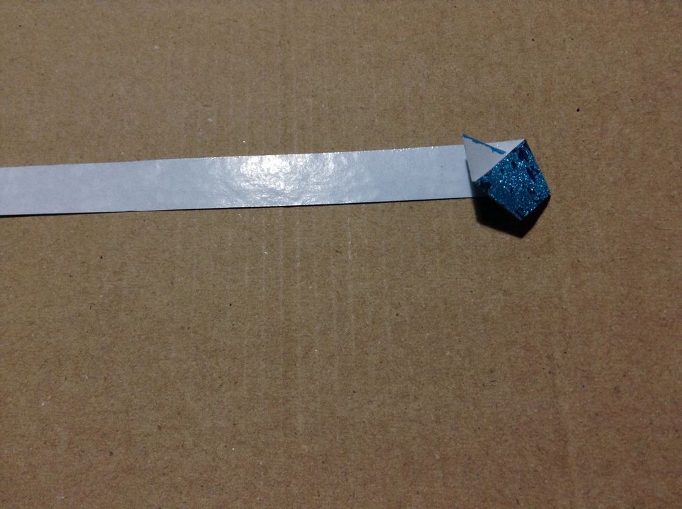 Next fold again to make a pentagon like this.