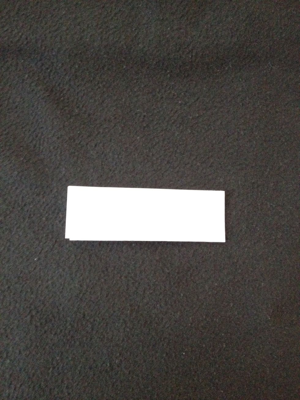 Next fold that same piece in half again.