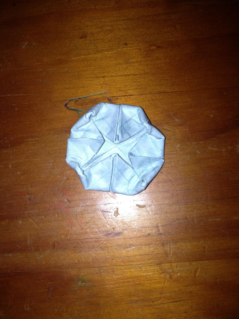 Next fold the corners in slightly and as equally  as possible