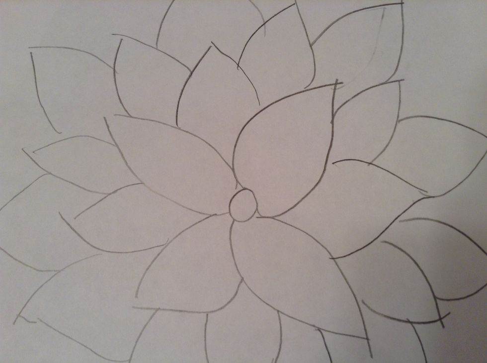 Next for some detail on your flower, the you can add thorns on your stem or extra pedals on your flower. If you want thorns draw small triangles by your leaves.