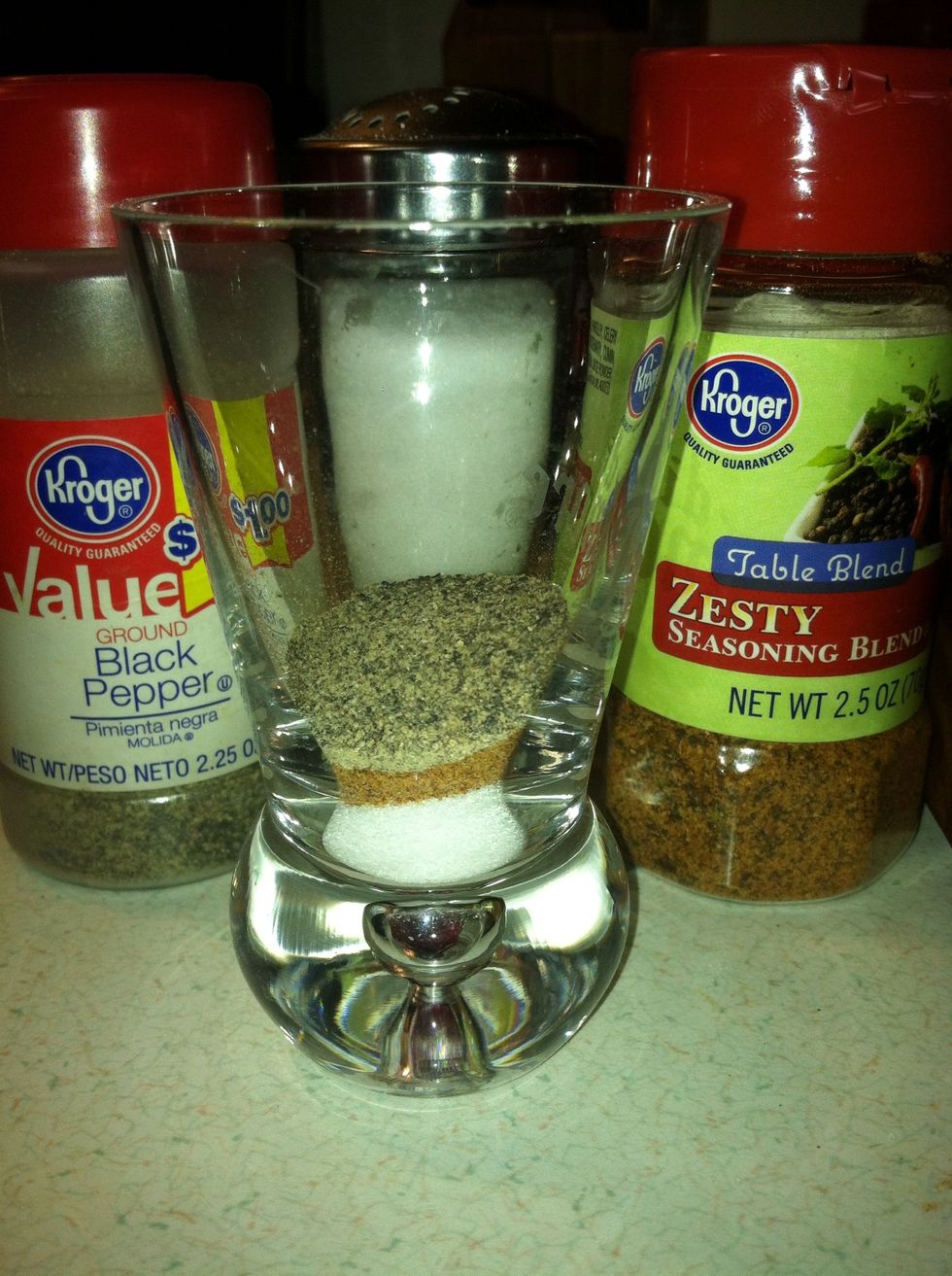 Next gather your salt, pepper, and your zesty seasoning.