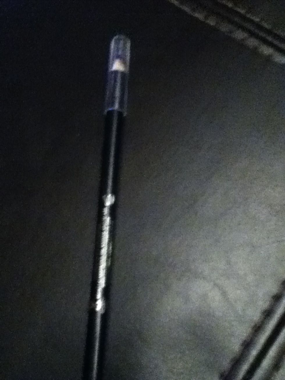 Next get eye liner or lip liner (black)