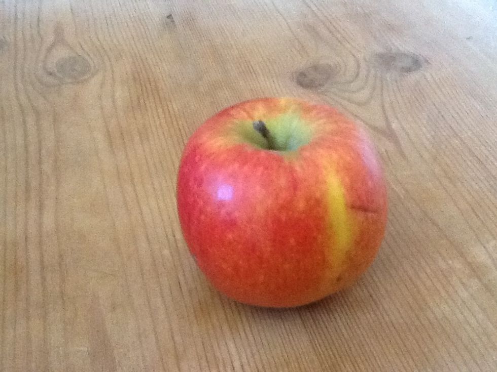 Next get something to draw, like this apple. Flowers are the obvious choice, but they can be quite tricky to get right. This apple is the perfect choice for a beginner.