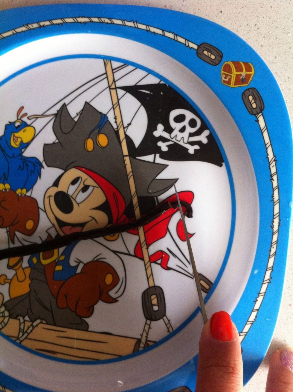 Next, get yo' vanilla bean and cut off the ends! It is preferred if you do it on a Mickey Mouse plate, but if you only have a Phineas and Ferb plate, then that is also acceptable