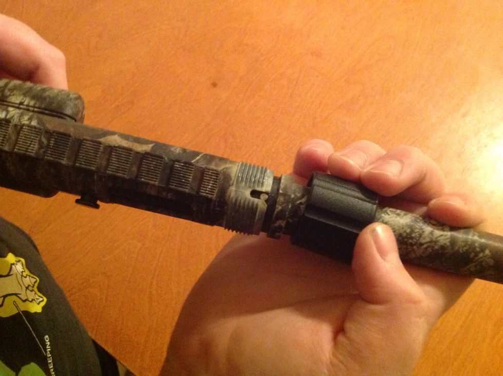 Next grab the barrel (long tube that the bullet comes out of when fired) and position it with the top of the gun like so.