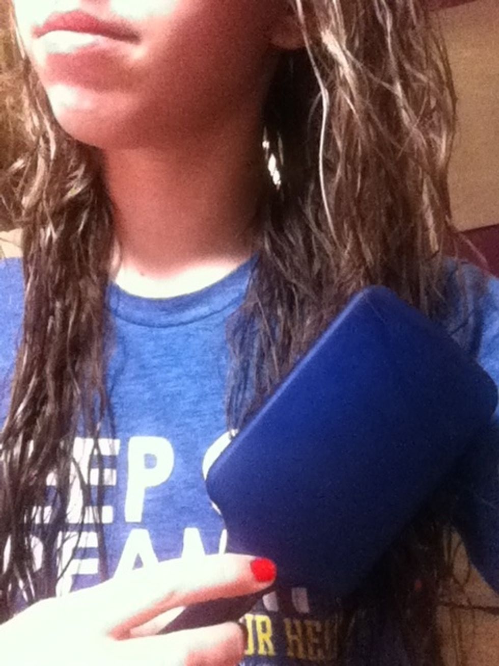 Next grab your brush and brush it out as straight as you can. (It will help when braiding)