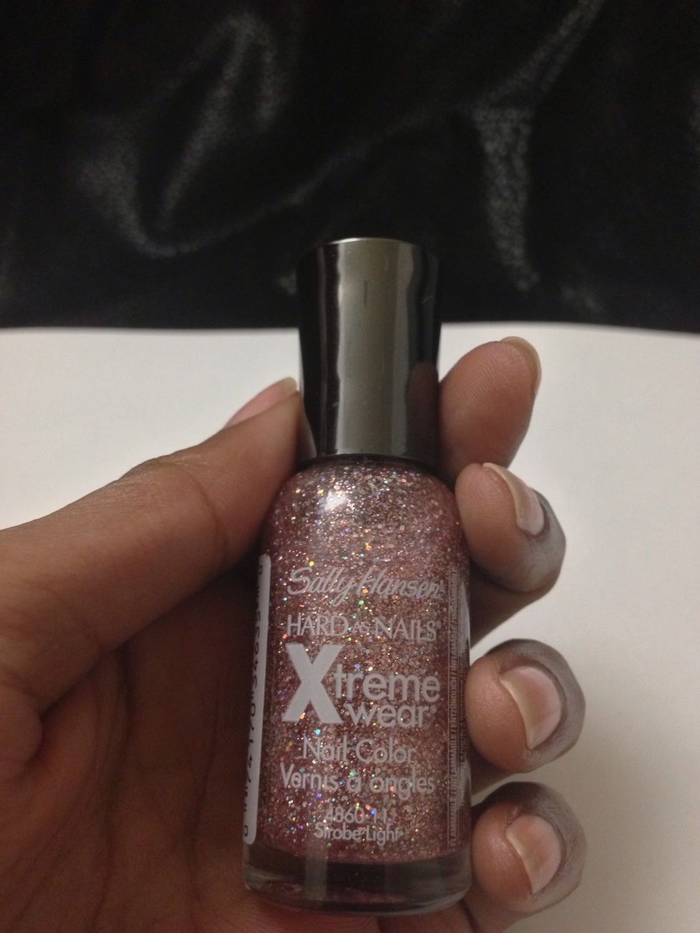 Next grab your glitter polish and paint all of your nails except one.