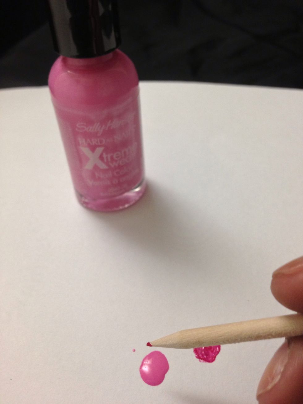 Next grab your light pink color and dab your toothpick to pick up some color. I am using Bubblegum Pink by Sally Hansen.
