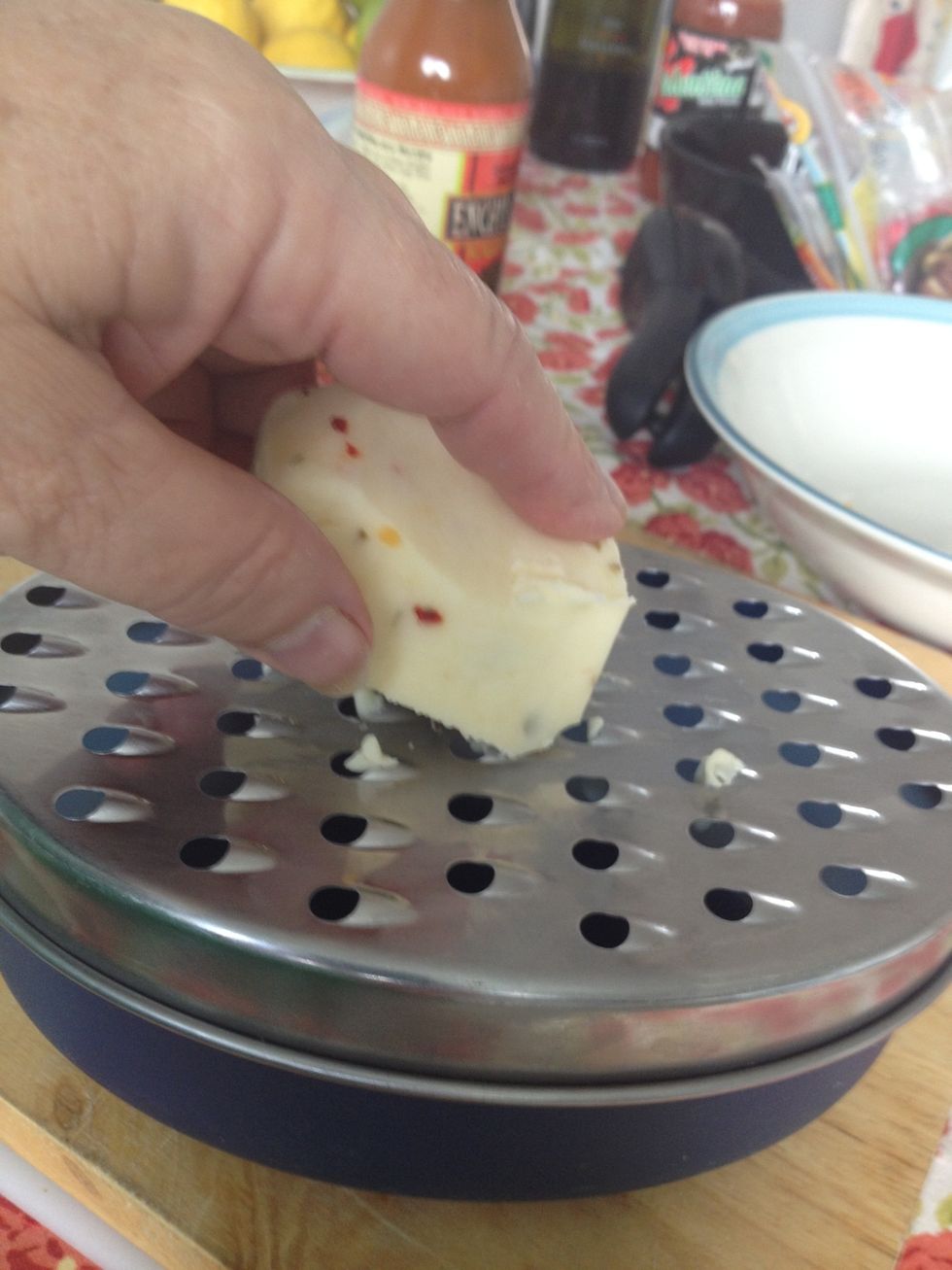 Next grate the cheese - I'm using both cheddar cheese and jalape\u00f1o jack cheese. They just happen to be the cheeses I had in my fridge.