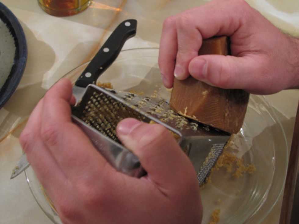 Next grate the sugar cane into a bowl.