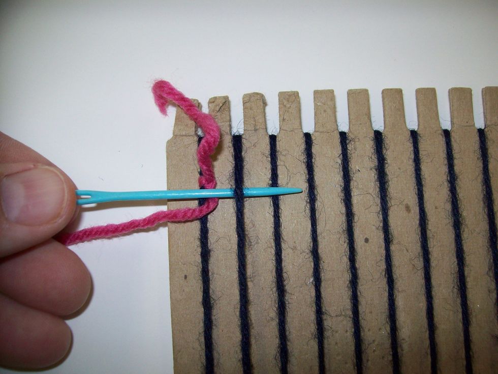 Next, have the needle go OVER the 3rd warp.