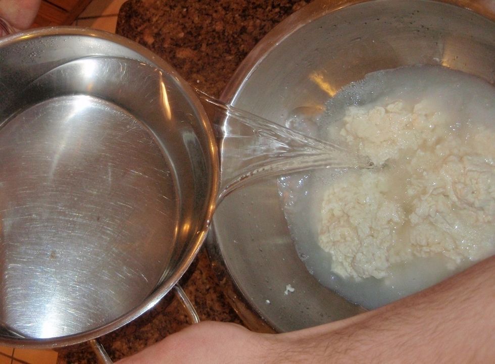 Next heat the water to 140-150 degrees and pour it gently over the small pieces of curd.