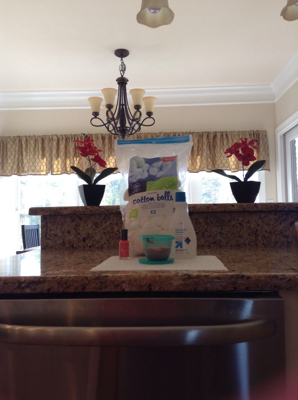 Next, how to apply.... Gather your supplies. The same color nail polish, your new glitter polish, nail polish remover, and cotton balls. Ready!